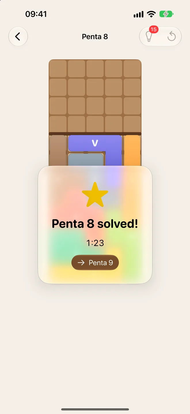 The win card over the board: a star, “Penta 8 solved!”, a time of 1:23 and a button to Penta 9.